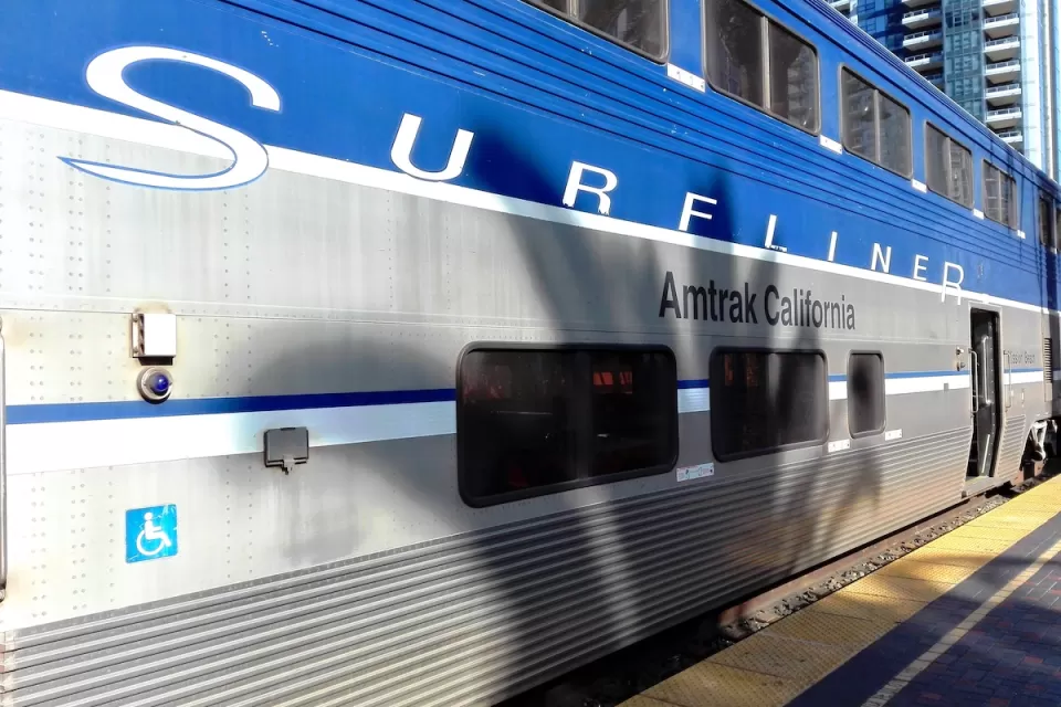 Blue and silver Pacific Surfliner train at platform in San Diego, California.